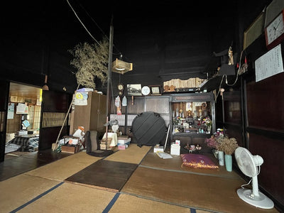 Beams above the living room and bamboo for cleaning soot "Traditional Japanese house" kominka