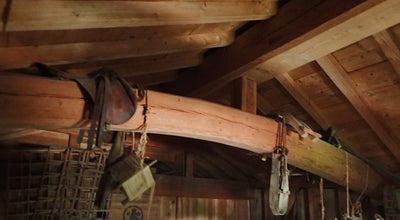 Curved beams in the attic (red pine)